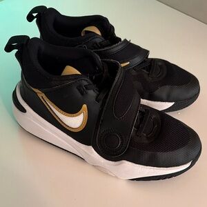 Nike Kids Black Sneakers with Gold Swoosh